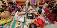 Shri Guru Paduka Pujana and Teertha Vitarana; Picture Courtesy Shri Chandrashekhar Padubidri