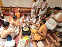 Shri Guru Paduka Pujana and Teertha Vitarana; Picture Courtesy Shri Chandrashekhar Padubidri