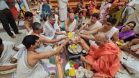 Shri Guru Paduka Pujana and Teertha Vitarana; Picture Courtesy Shri Chandrashekhar Padubidri