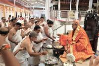 Shri Guru Paduka Pujana and Teertha Vitarana; Picture Courtesy Shri Chandrashekhar Padubidri