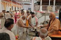 Shri Guru Paduka Pujana and Teertha Vitarana; Picture Courtesy Shri Chandrashekhar Padubidri