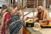 Tirtha Vitarana; Picture Courtesy Shri Jaikishan Kandlur