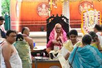 Shri Guru Paduka Pujana and Tirtha Vitarana; Picture courtesy Shri Sadashiv Bana
